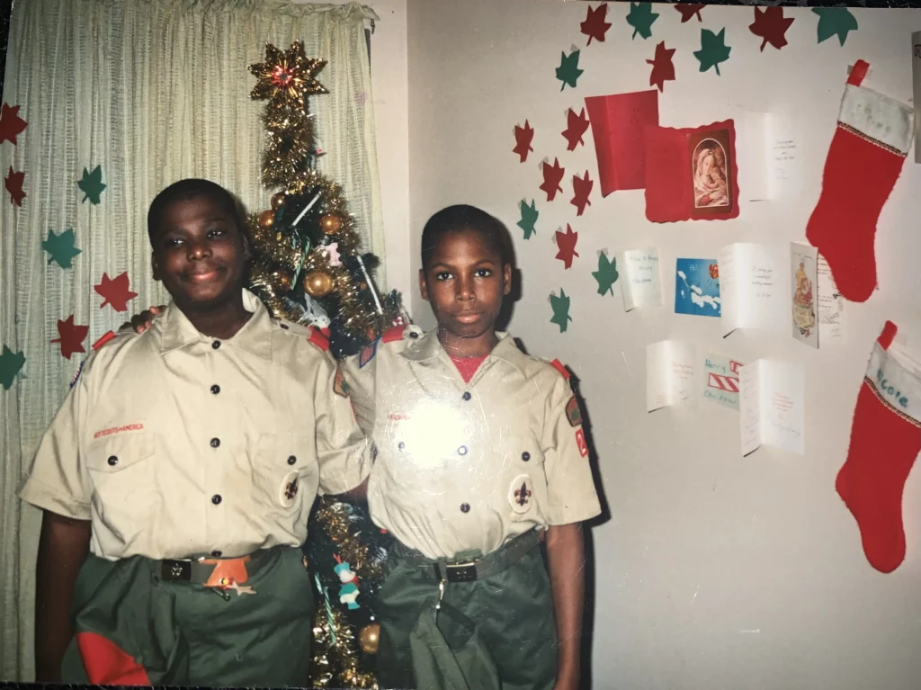 Fredrick Riley and his brother in Boy Scout uniforms.