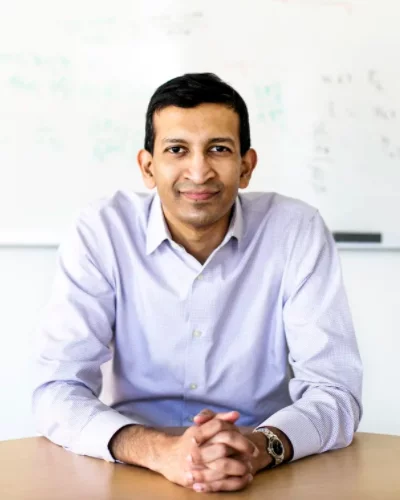 Raj Chetty is the William A. Ackman Professor at Harvard and Director of Opportunity Insights, known for his work on economic opportunity using big data.