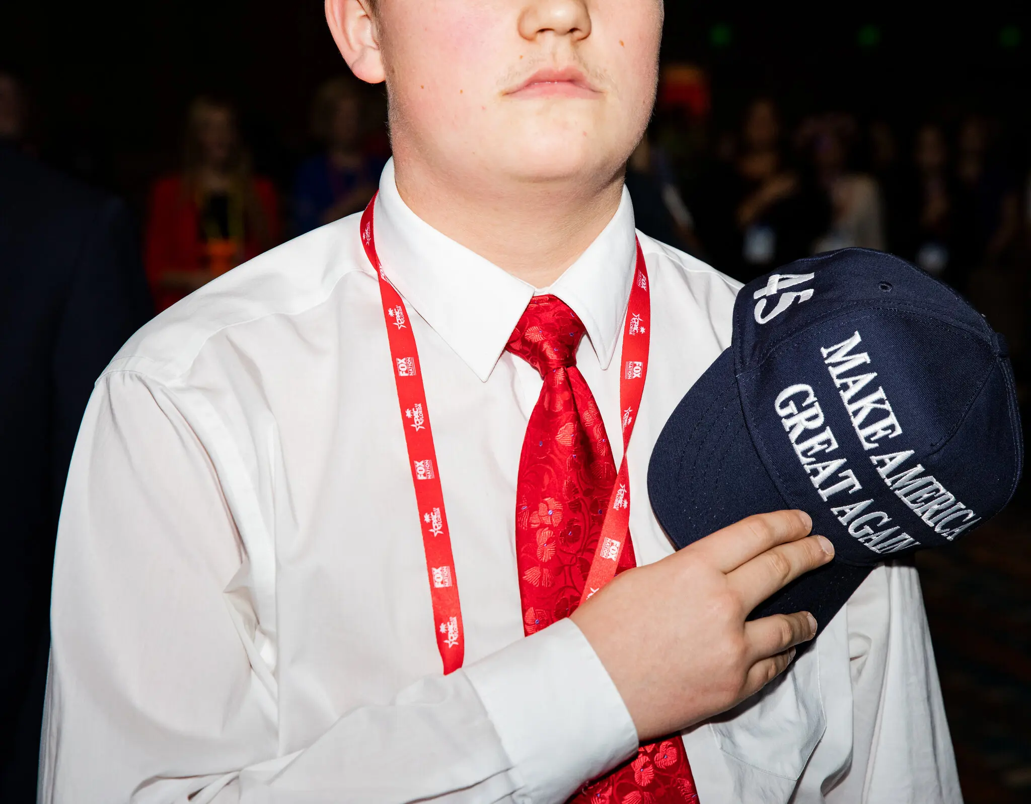 A republican supporter doing the pledge of allegiance