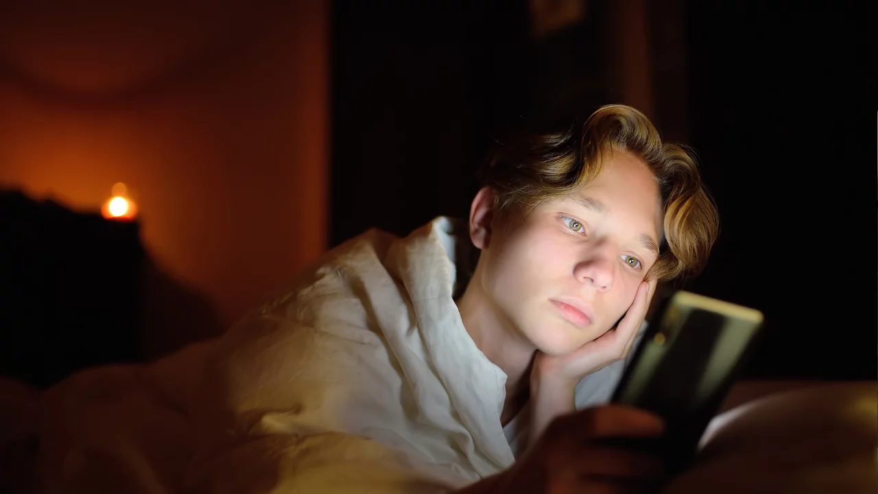 A young man online sports betting.
