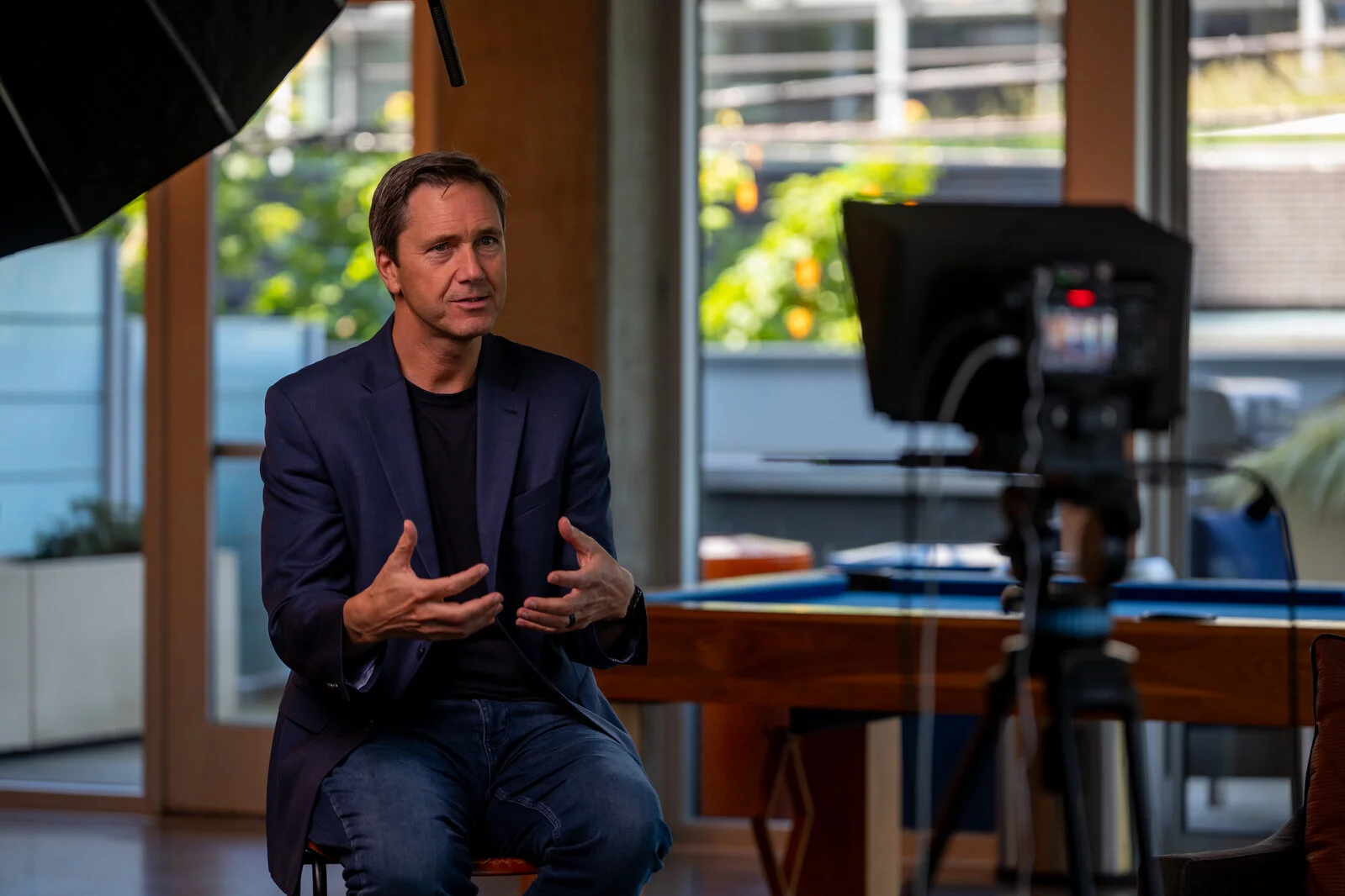 Richard V. Reeves talking to the camera during a video shoot.