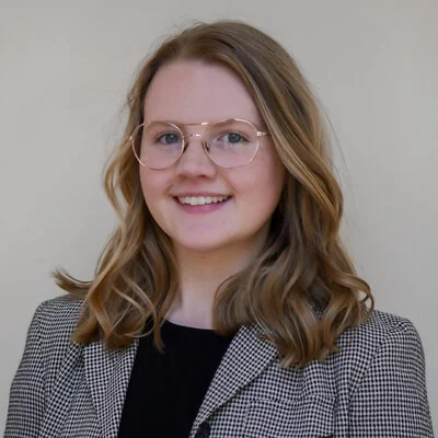 Headshot of Emily, a Notre Dame economics PhD student specializing in demographic trends related to technology and policy, with an emphasis on health and behaviors.