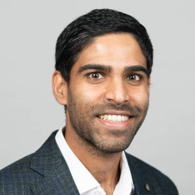 Headshot of Matthew, a Harvard Ph.D. candidate focused on researching intergenerational mobility and the effects of social capital on long-term outcomes for boys.